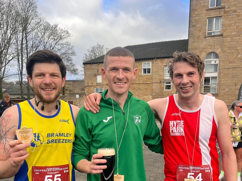 Thomas Hodgson (centre) set a new course record with a time of one hour and 45 seconds. He is flanked by (left) second-placed Michael Vargas and third-placed Ric Vowden