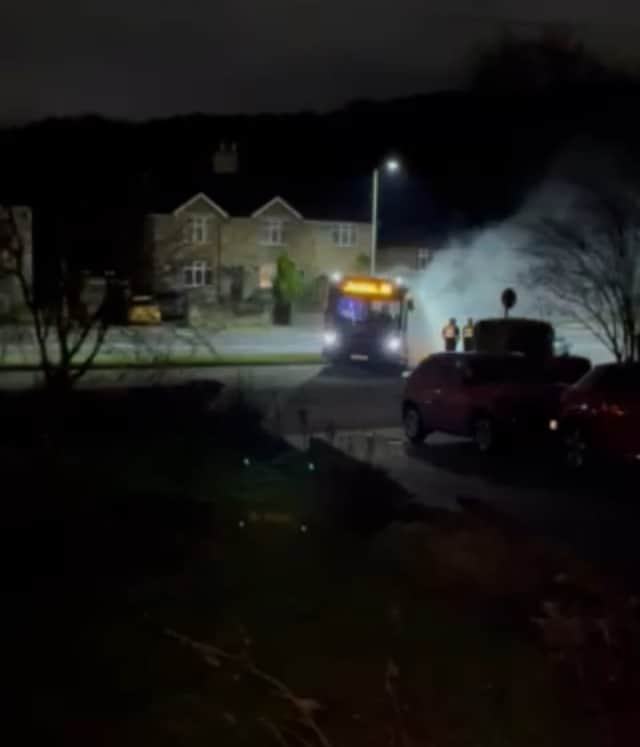 This is the moment a bus got stranded on a grass verge in Abbey Lane in Sheffield, causing smoke to plume from its exhaust when it tried to accelerate.