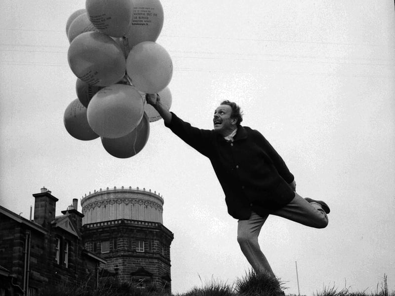 Actor Terry-Thomas releases balloons on Blackford Hill in aid of Scottish National Institute of War Blinded in April 1960.