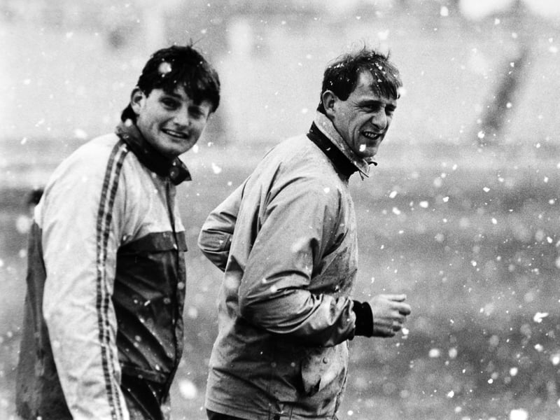 April 1989 and Martyn Moxon and Jim Love brave weather conditions not entirely in keeping with the first net practice.
