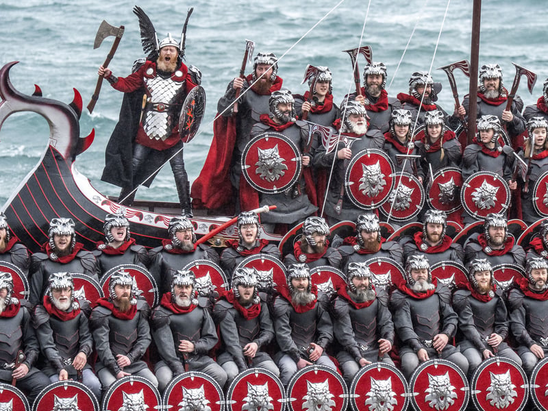 Members of the Jarl Squad on the galley at the harbour.