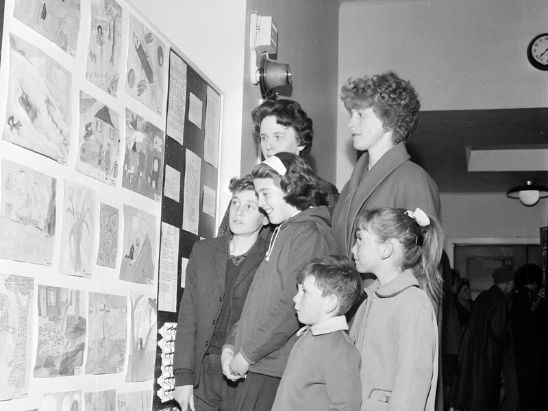 Parents inspecting pupils' artworks at Danderhall School in June 1965.