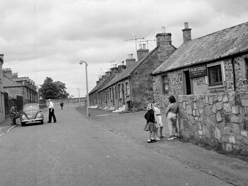 The main road through Danderhall village in July 1964.