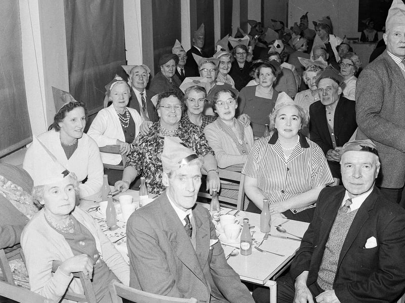 Pensioners enjoy a Christmas party at Danderhall School in December 1964.