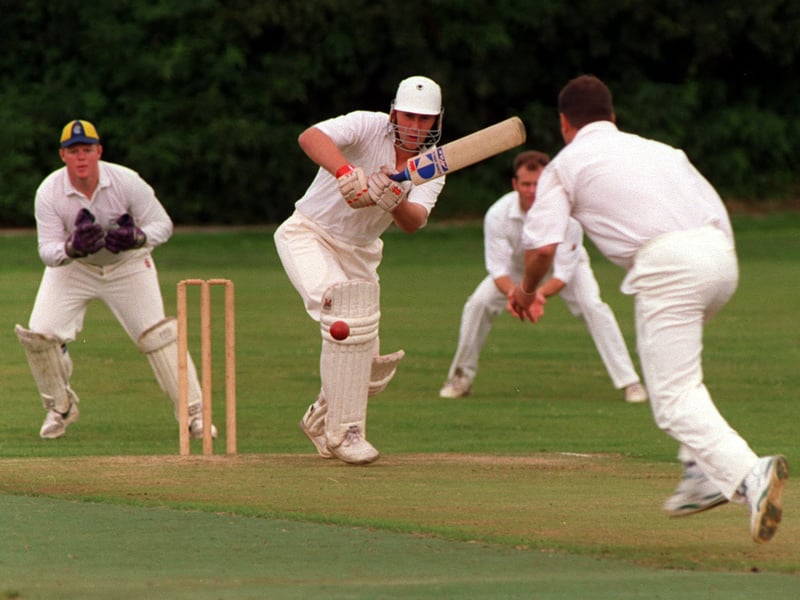 Match action from Whitkirk v Great Preston in August 1997. Great Preston batsman Ian Newton plays a shot from Andy Proctor watched by Whitkirk's Aussie wicketkeeper Warren McLaren.