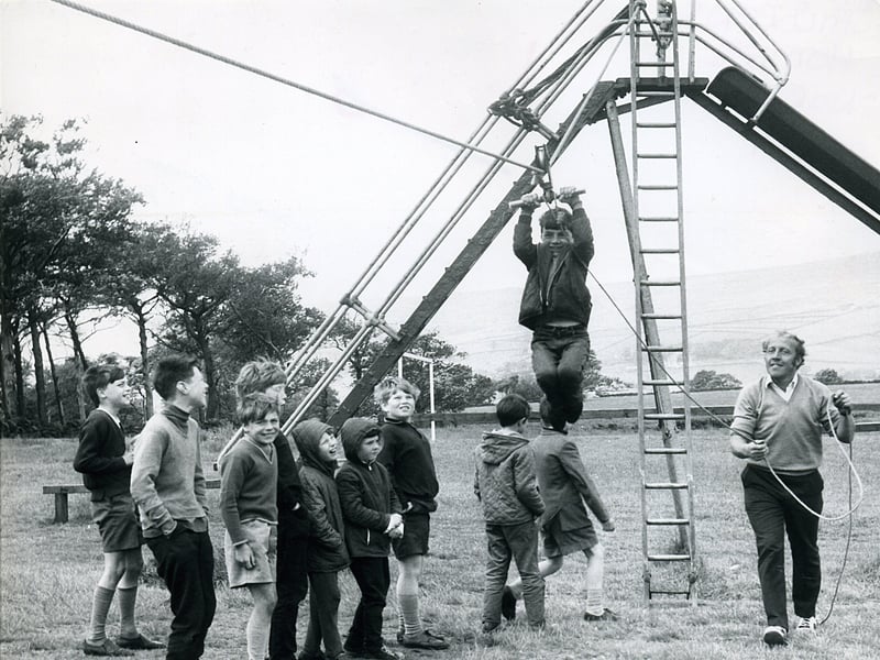 Brian Riley helps children on the zip wire at Halifax Children's Holiday Home, Norland, in around 1971