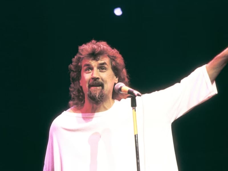 Tina Broughton: "Billy Connolly in his black & white striped trousers, packing his car boot on Blackpool prom."