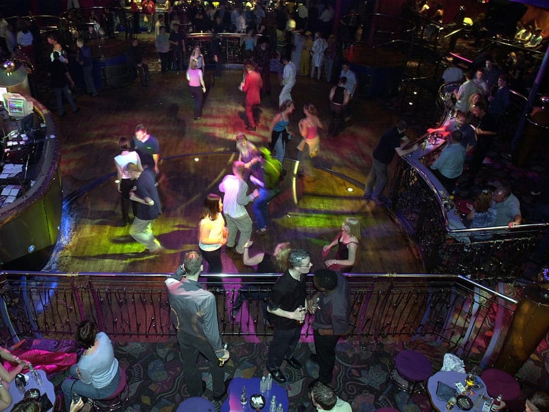 Revellers on the dance floor at the Revolution Club on Lothian Road, Edinburgh, in June 2001