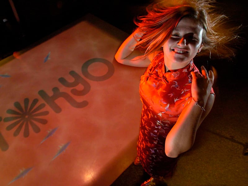 Chantelle Contreras, from Edinburgh, checks out the interactive dance floor at the new Japanese-themed nightclub Tokyo, which is part of the Le Monde Hotel on George Street, in July 2006