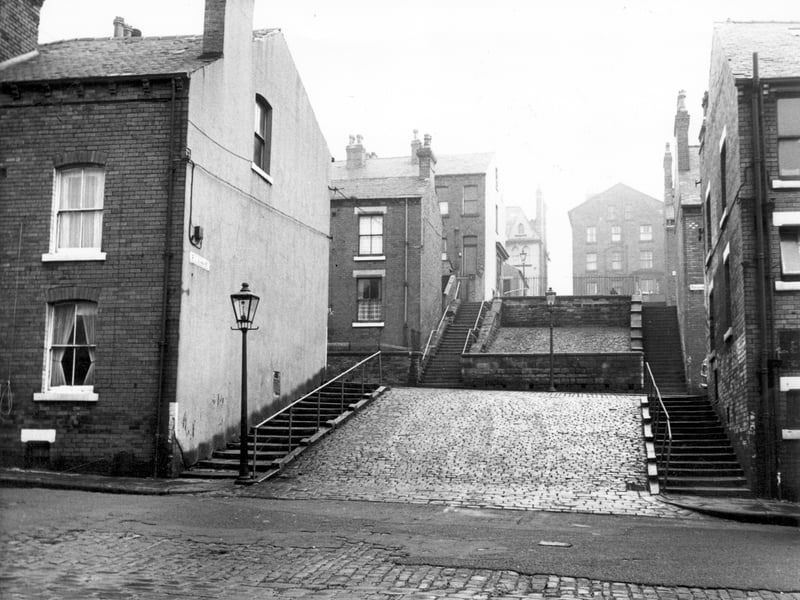  Westfield Crescent, which runs from left to right across the foreground. The photographer is standing with the junction of Rillbank Street behind and it continues with the two sets of steps climbing the cobbled hill inbetween the red brick terraced houses of Rosebank Grove, then Rosebank View. Pictured in November 1967.
