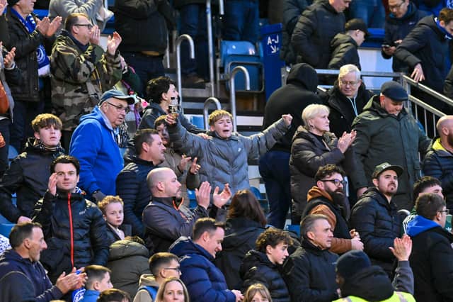 Pompey fans roared their team on to a big Championship win over West Brom.