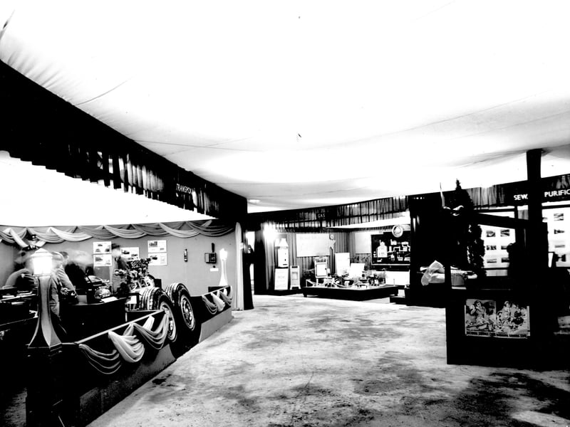 An exhibition of the work of 27 council departments in  September 1947. It was held in an unfurnished store on Briggate. A display of greenery and flags, tented ceiling decoration. In view, featured topic NALGO union which many council workers joined.