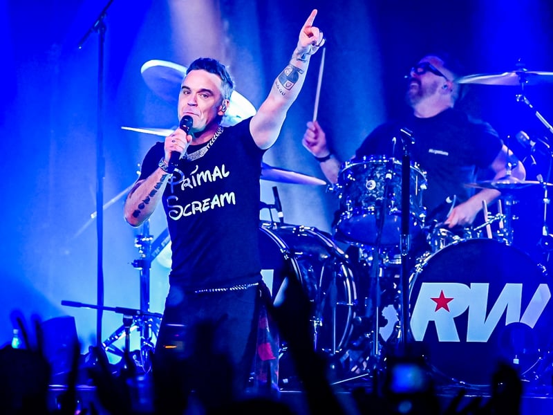On the launch of Britpop, Robbie said he "set out to create the album that I wanted to write and release after I left Take That in 1995. It was the peak of Britpop and a golden age for British music. I’ve worked with some of my heroes on this album; it’s raw, there are more guitars and it’s an album that’s even more upbeat and anthemic than usual."