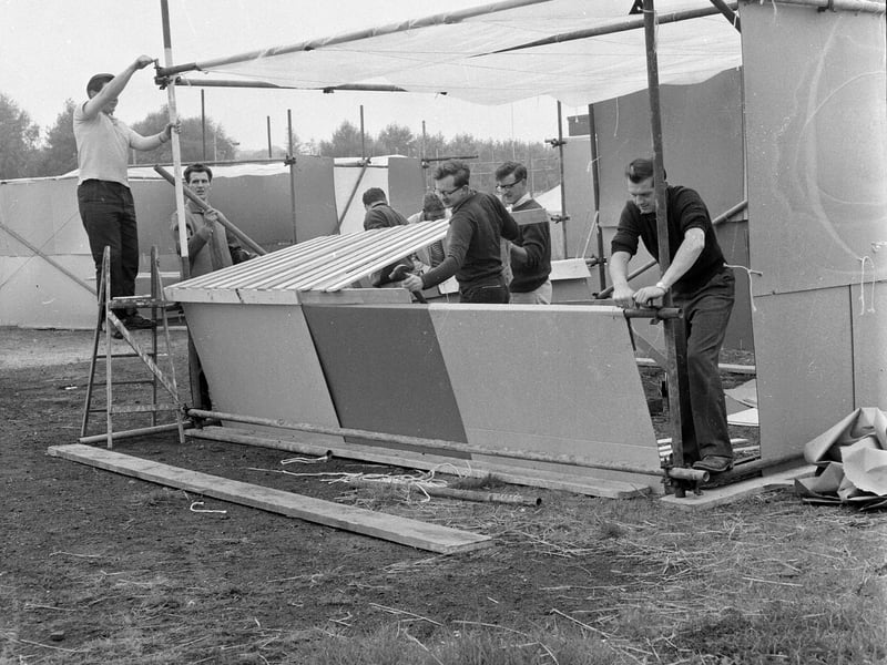 Men prepare Murrayfield Ice Rink car park for the Corstorphine Round Table Festival Fair held in August 1961.