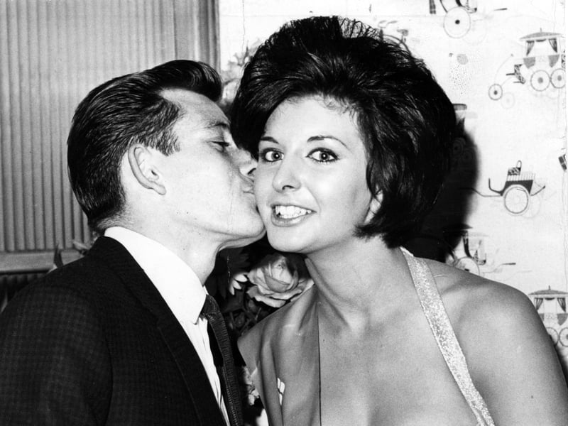 Marti Caine (then Lynne Shepherd) receives a kiss from a Sheffield Wednesday player after being crowned University Rag Queen in October 1961