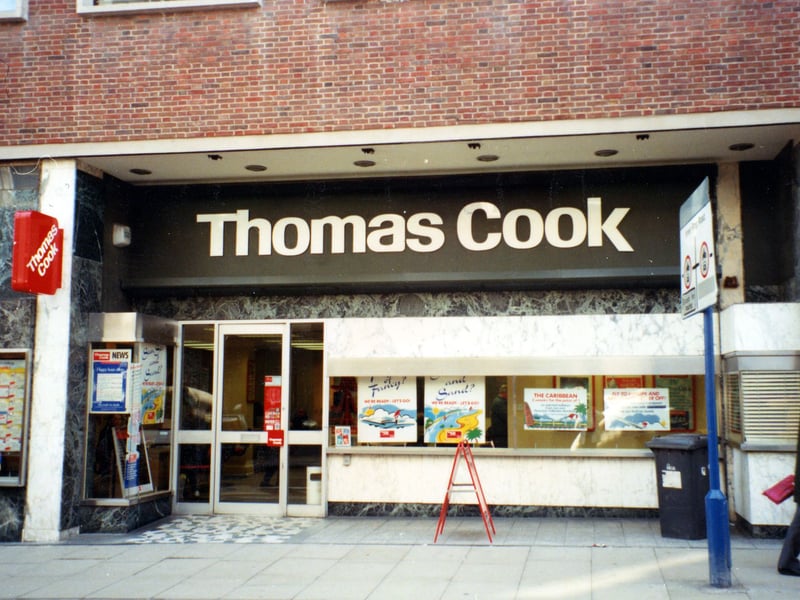 Thomas Cook travel agents at nos. 99-103 Albion Street in August 1991. Various holidays are advertised in the windows.