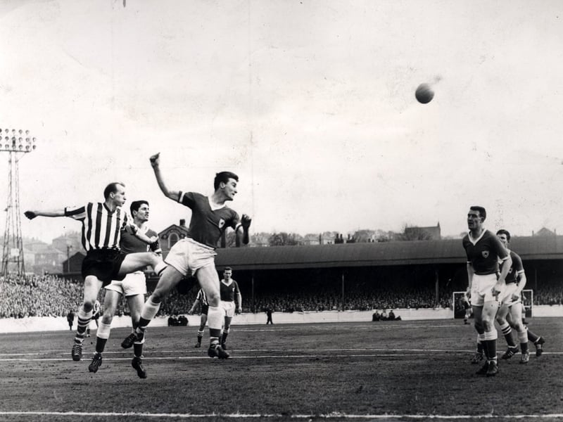 Sheffield United player Keith Kettleborough is beaten to the ball by Leicester's Richie Norman in the FA Cup semi-final on March 18, 1961