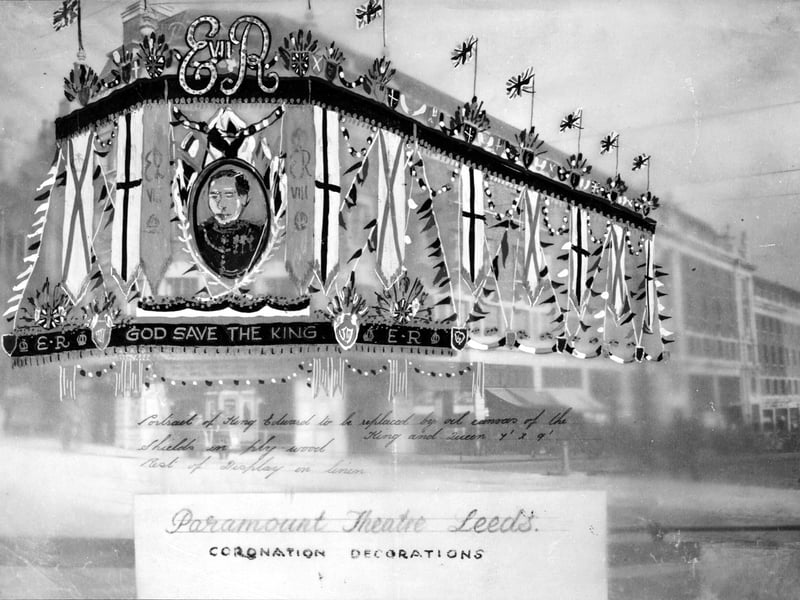 A view of the Paramount (name changed to the Odeon in 1940), at the junction of The Headrow and Briggate in March 1937. This is an artist's impression of decorations for the Coronation of King Edward VIII, which did not take place. He abdicated in favour of his brother King George VI.