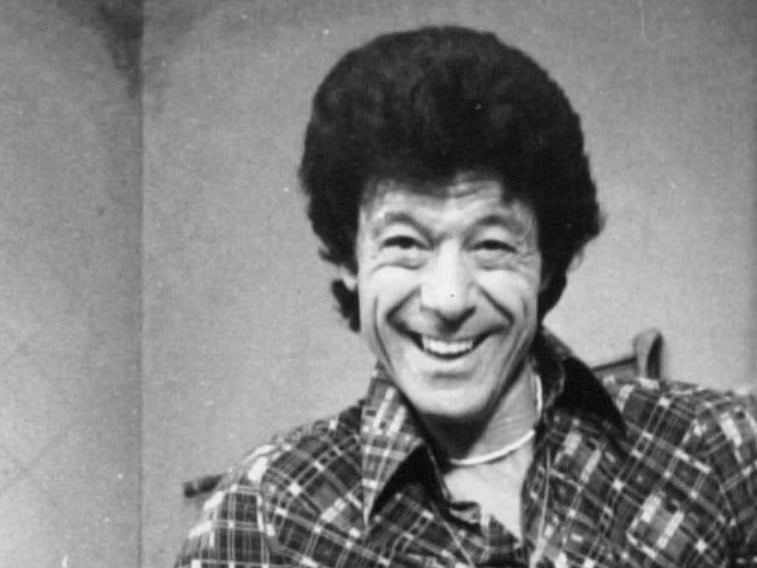 Tony Constantine saw Lionel Blair. Lionel Blair in Royce Men's Wear collecting his new suit when he was in Panto at the Lyceum. Photo: Iconic Media