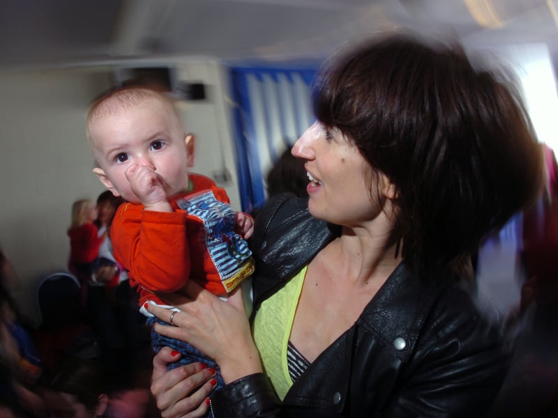 Gemma Bell and her nine-month-old son Henry Hutcheson dance along at the 'Disco, Baby' event held in Meadowbank Sport centre in October, 2009.