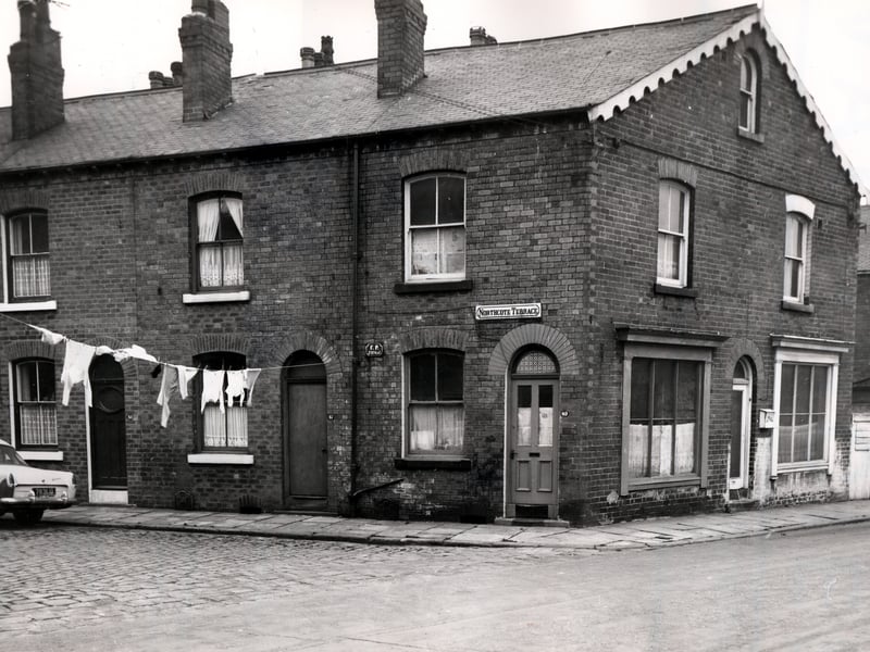 The end of Northcote Terrace as it joins Northcote Road showing through terraced houses. Pictured in November 1965.