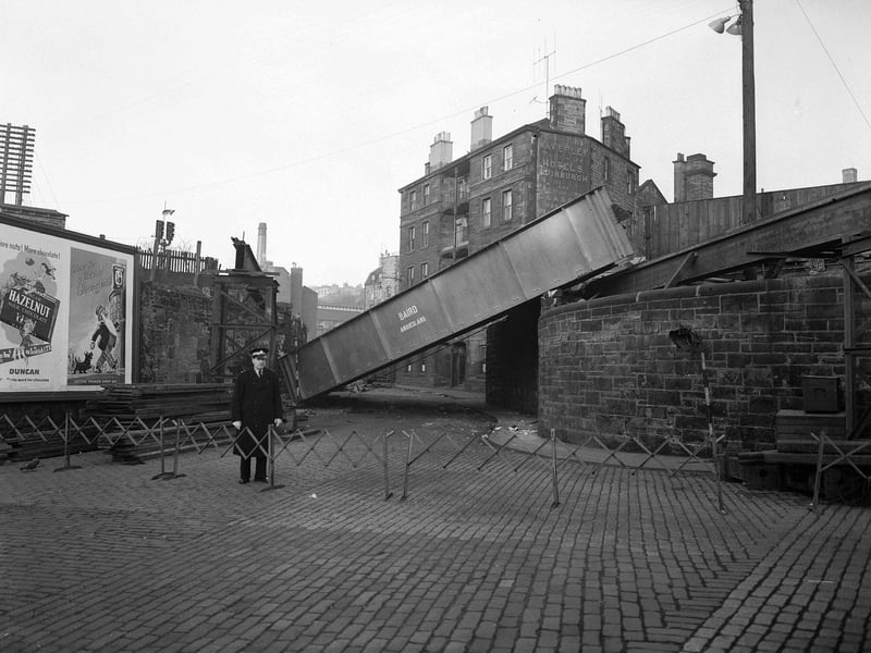 Abbeyhill Railway Bridge in Edinburgh collapsed on to Brand Place in February, 1958, as it was being settled into position after construction to replace the old wrought iron bridge.
