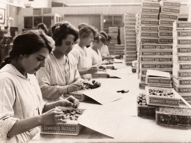 Workers hand packing Rowntree's Fruit Pastilles in York, in 1920