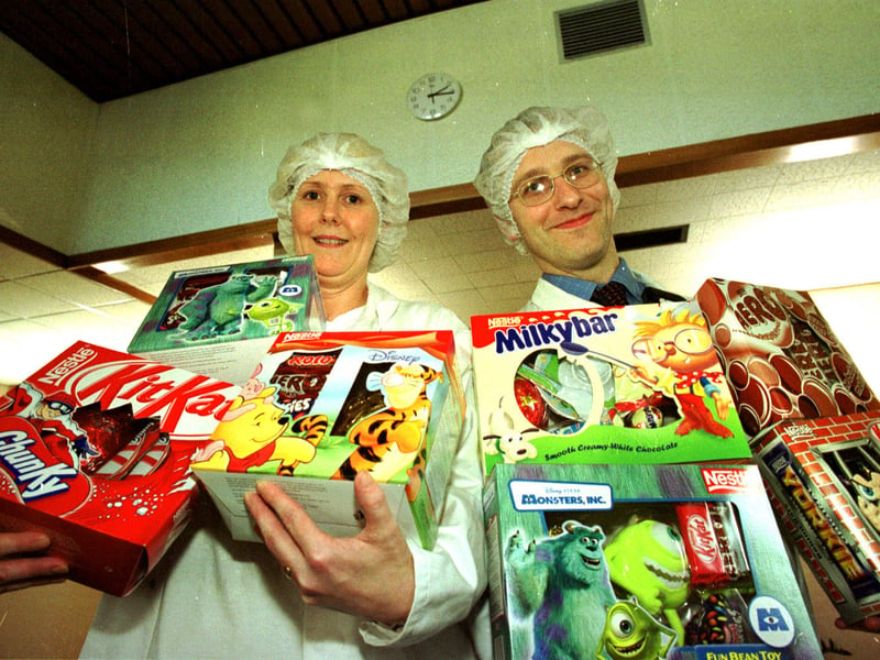 Easter egg plant operator, and Andy Furness, section manager of Easter eggs with some of the 18.5 million Easter eggs they were making in Easter 2022