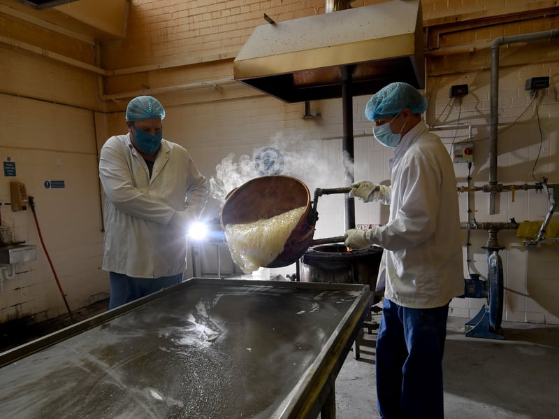 Workers at the Maxons sweet factory, Sheffield, in 2021