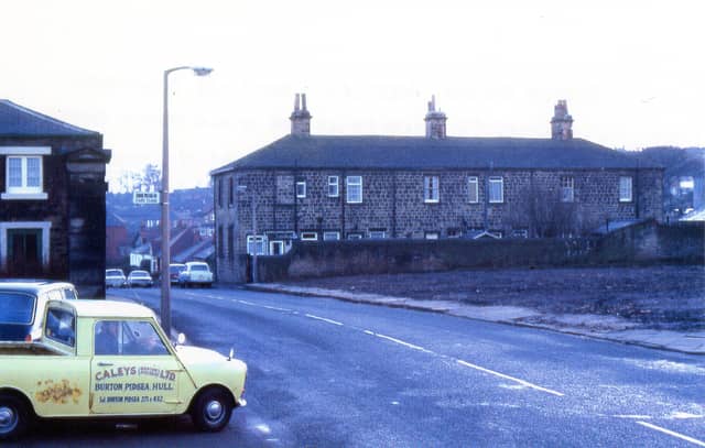 A view along Armley Ridge Road looking towards Stanningley Road taken from the main gates to Gott's Park circa 1970s. The back of Armley Ridge Terrace can be seen to the right. The spare ground on the right was formerly nos. 167-173 Armley Ridge Road.