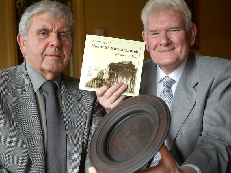 Pat Gavan, right, presents artefacts from Mount St Mary's Church to Tommy McLoughlin, manager of the Irish Centre.