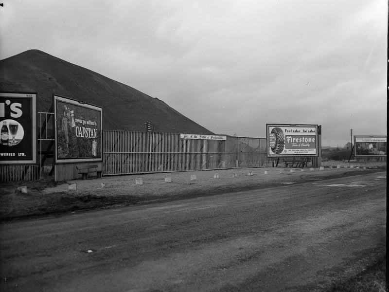 A sign on a roadside fence indicating the site of the Battle of Prestonpans in February 1962.