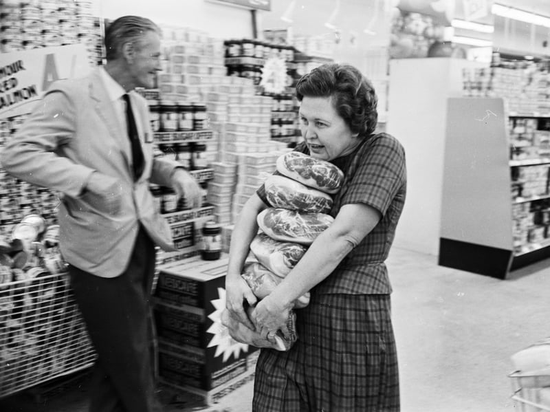 Mrs Buzidragis, winner of a US supermarket sweep contest, attempts to repeat her prize-winning feat at a Tesco store in August 1966