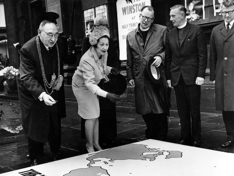 The Lord Mayor of Leeds, Alderman Joshua S. Walsh, and his wife, the Lady Mayoress, attend the opening of Christian Aid Week at the Holy Trinity Church in May 1967.