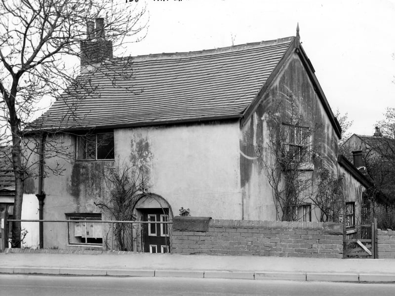 One of a pair of houses in Whitehall Road close to the junction with Back Lane at Upper Moor Side. The house, numbered 738, was owned at the time by Mrs. G. Smith. The exterior walls are cement rendered and the entrance is at a lower level than the road and is approached via. a gateway. Pictured in May 1964.