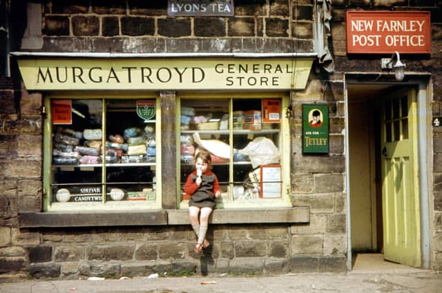 The little girl perched on the window sill enjoying an ice lolly is Vanessa Sharp.