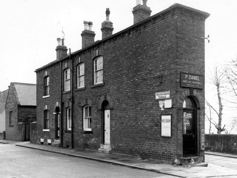 On the left part of what was St. Michaels Parish Room Parochial Hall can be seen. Number 4 Nutting Grove Terrace follows to the right, then number 2, a wedge shaped building which was also a sweet confectionery shop. This is the junction with Pontefract Terrace. Pictured in March 1965.