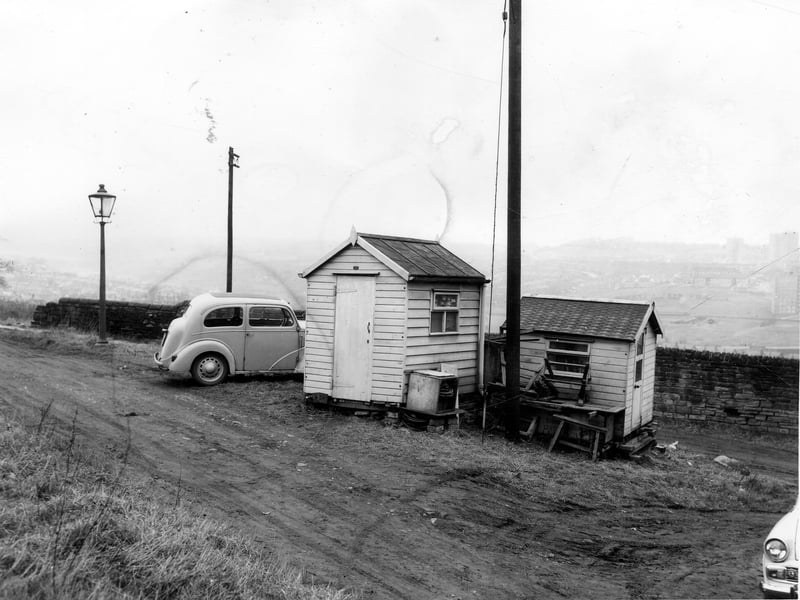 Two small sheds at the junction of Bawn Lane and Bawn looking across Silver Royd Hill in the direction of Tong Road. Pictured in March 1965.