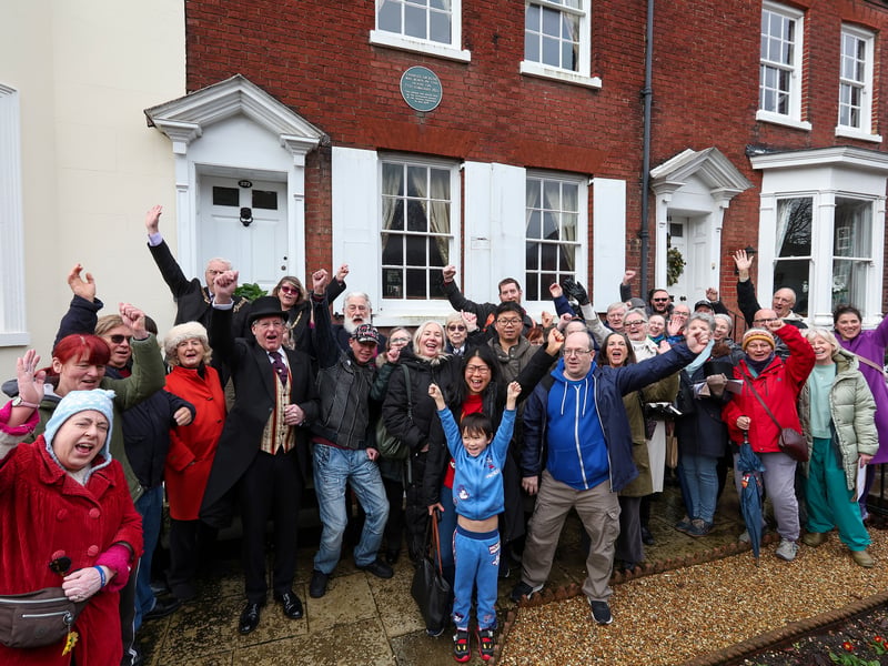 Onlookers celeberate the anniversary of Charles Dickens' birth. Wreath laying for author Charles Dickens at his birthplace in Mile End Terrace, Portsmouth, on the 214th anniversary of his birth
Picture: Chris Moorhouse (070226-05)