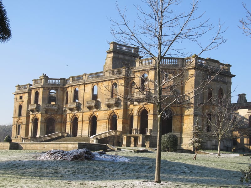 A ruined mansion situated in Worcestershire, managed by English Heritage. It was once a central hub for high society gatherings during the Victorian period. It was destroyed by a major fire in 1937. Despite this, visiting the dramatic ruins is a popular day trip in the area.