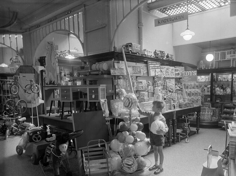 A young boy in the toy department of Jenners, on Princes Street, Edinburgh, in August 1962
