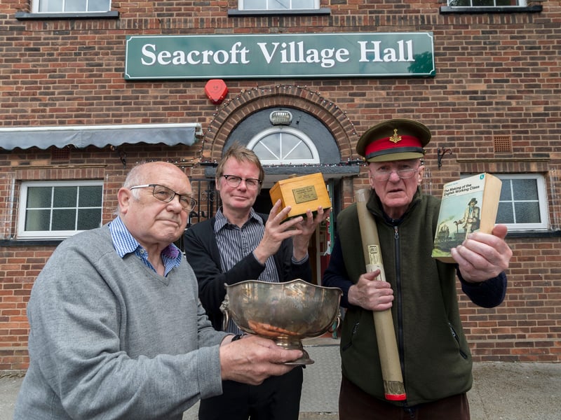 July 2016 and pictured are members of the Seacroft local history group with items that were due to go on display  as part of Seacroft Gala celebrations. Pictured from left, are Bill Askin, Boff Whalley, former member of Chumbawamba, and Robert Shoesmith-Taylor-Marshall.