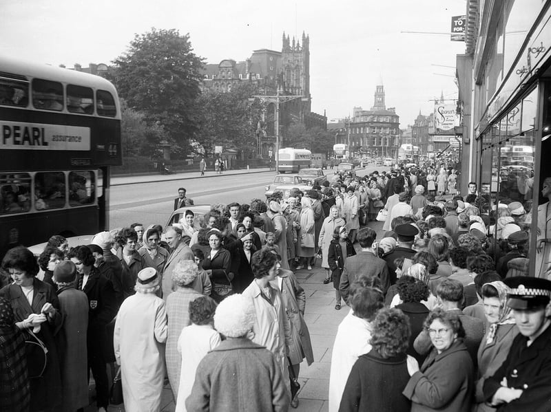 Shoppers queue to get into Darling's department store, on Princes Street, Edinburgh, for the sale in July 1963