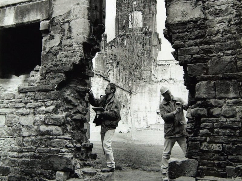 Barry Reed and Alan Walters pictured restoring the refectory.