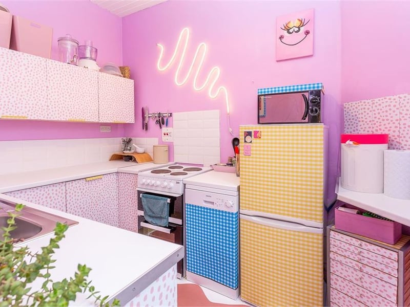 The kitchen comes with a range of wall and base units. 