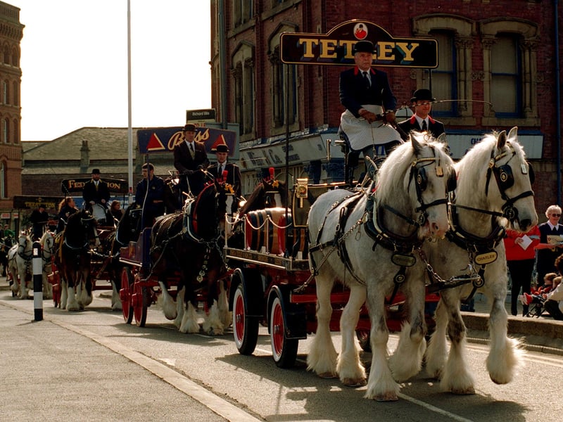 Celebrating the third anniversary of the opening of Tetley's Brewery Wharf, a parade of seven brewers drays paraded through the city.