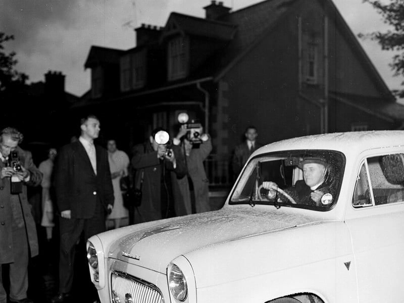 A bride leaves Saughton Prison after being permission to marry a prisoner in October 1958.