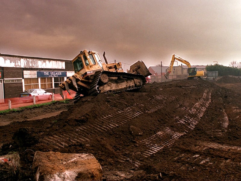 Diggers rip up the pitch at McLaren Fields, the former home of Bramley RL. The site was being developed for housing.