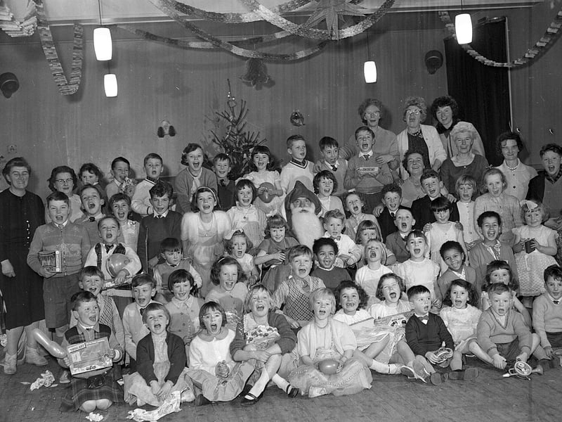 The Saughton Mains branch of St Cuthberts Co-op Women's Guild hold a children's Christmas party in December 1962.