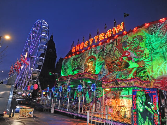 The attractions on The Headrow in Leeds City Centre all lit up.